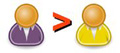 Icono de dos personas separadas por el operador de comparación mayor.