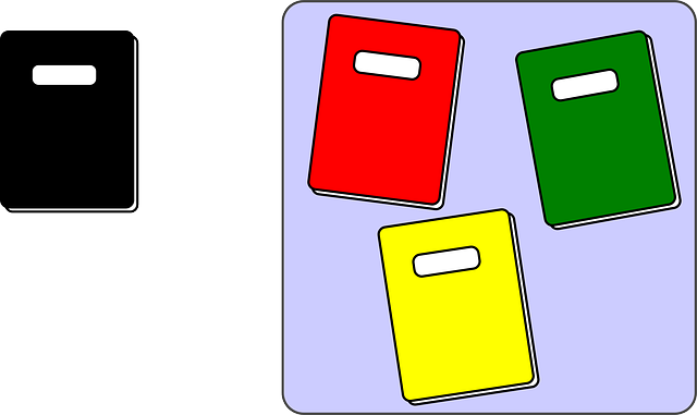 Ilustración de varios libros de diferentes colores,  con etiquetas en blanco en su portada